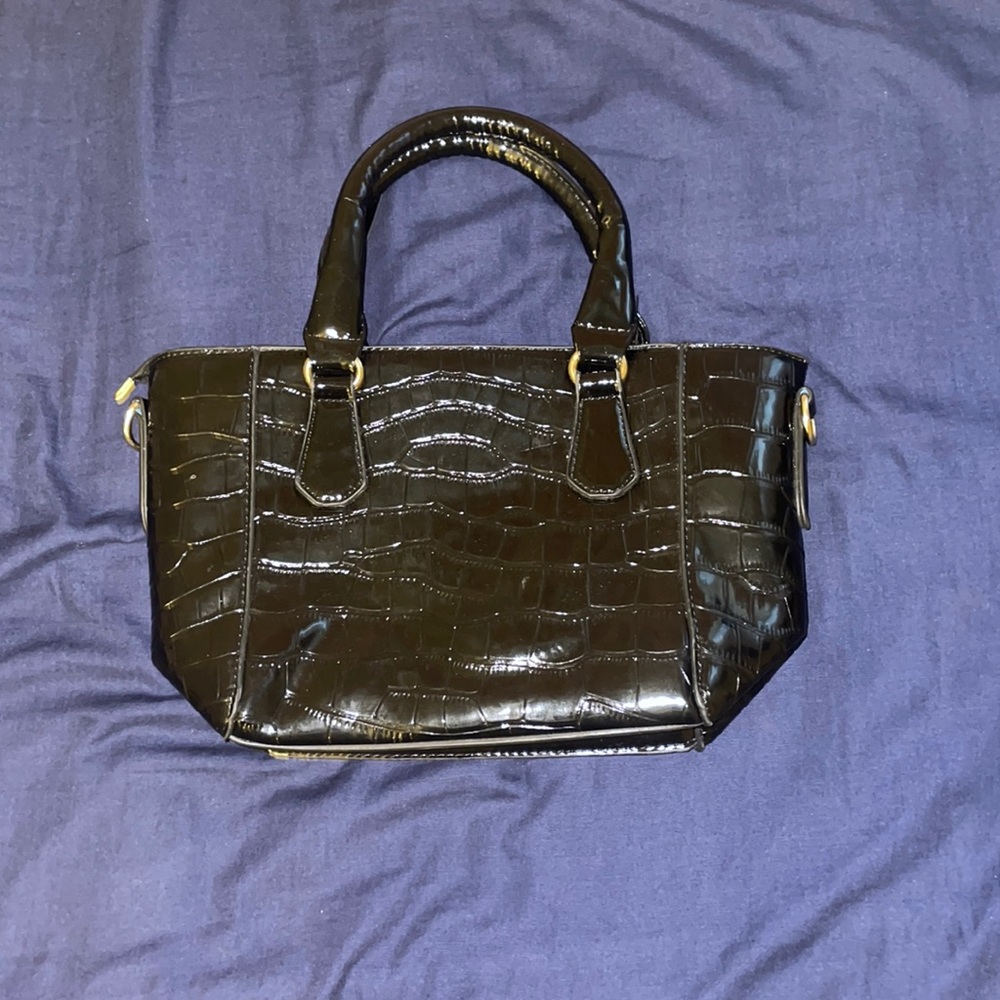 Black textured purse with gold harware